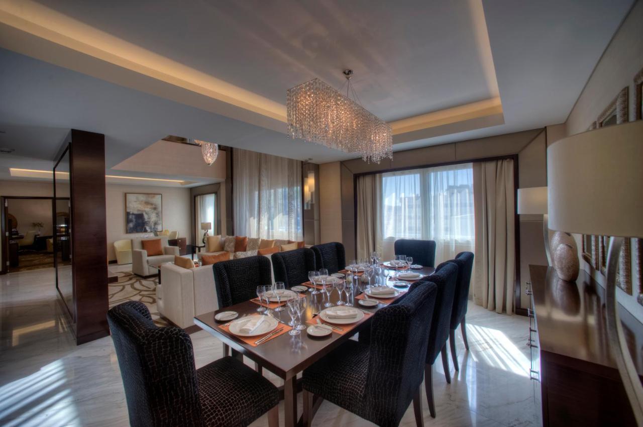 Crowne Plaza Dubai Deira By Ihg Hotel Ngoại thất bức ảnh A dining room in a suite at the Ritz-Carlton, DIFC
